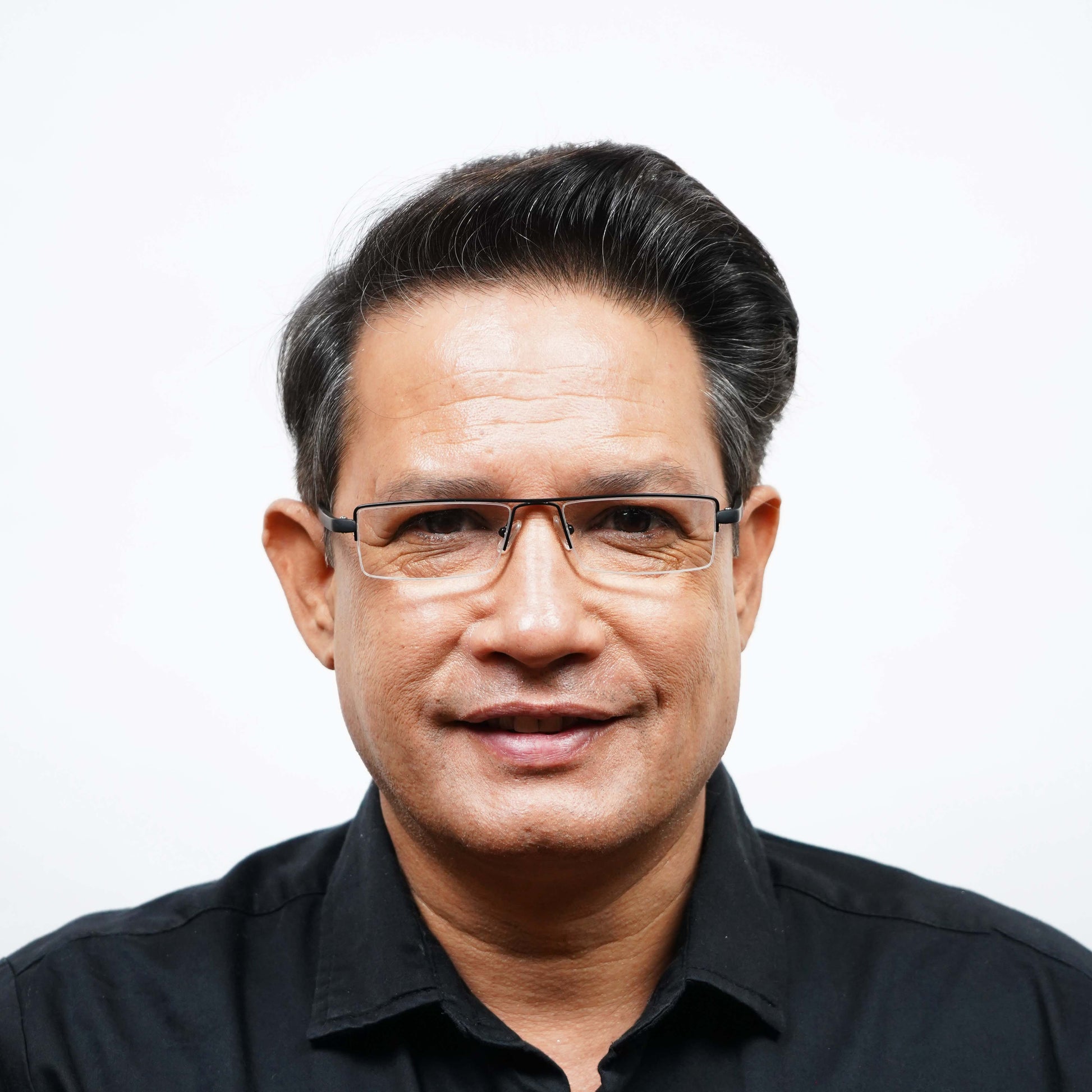 Man wearing Pagina black half-rim reading glasses