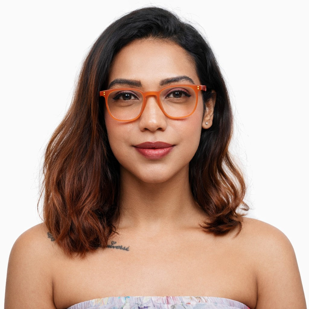 Woman wearing Pixo reading glasses in red
